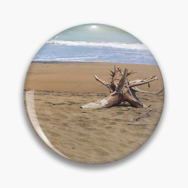 Item preview, Two dead woods on sand at Pacitan beach designed and sold by kall3bu.