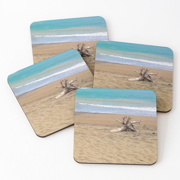Item preview, Two dead woods on sand at Pacitan beach designed and sold by kall3bu.