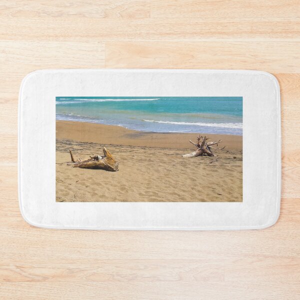 Item preview, Two dead woods on sand at Pacitan beach designed and sold by kall3bu.