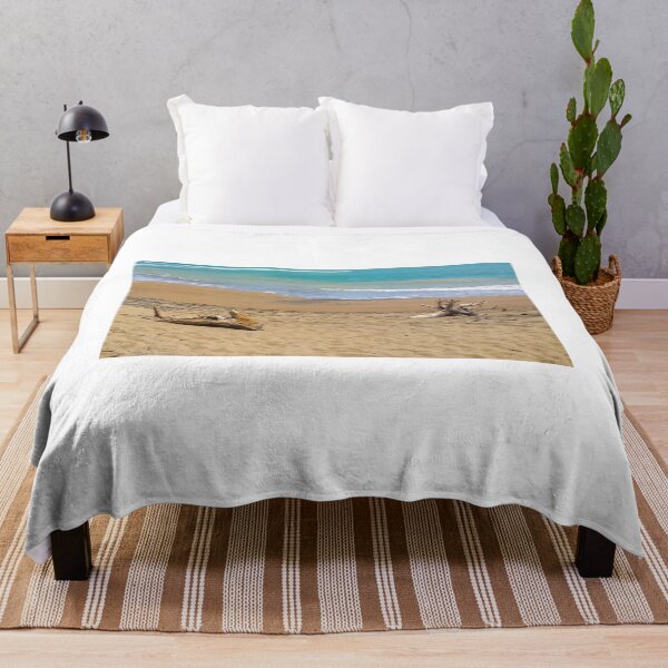 Item preview, Two dead woods on sand at Pacitan beach designed and sold by kall3bu.