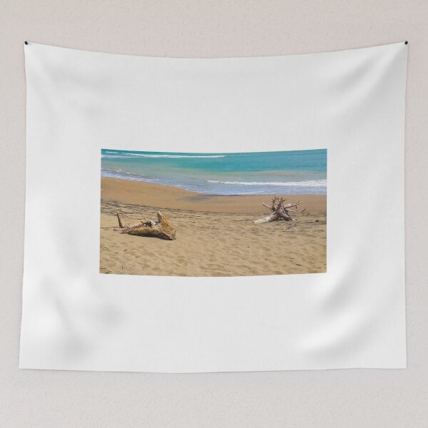 Item preview, Two dead woods on sand at Pacitan beach designed and sold by kall3bu.