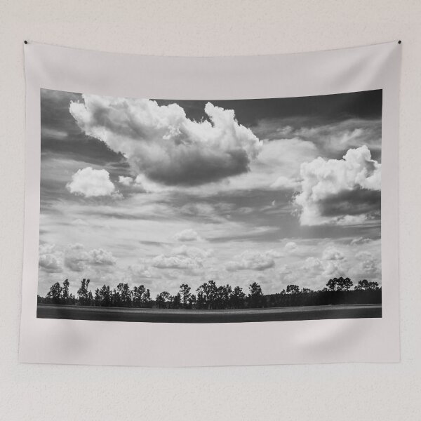 Item preview, Big Puffy Clouds Floating Over Treeline Black and White designed and sold by Bill Slader.