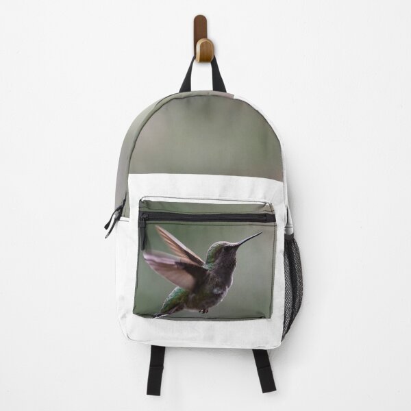Item preview, hummingbird flies through the air with two legs extended designed and sold by pnywest.