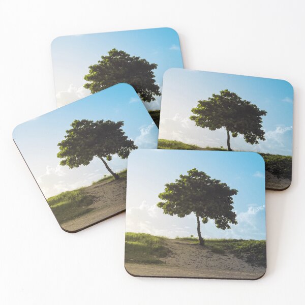 Item preview, isolated tree at sunrise in a blue sky designed and sold by willamsharking.