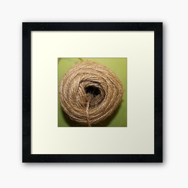 A coarse rope of natural material Framed Art Print