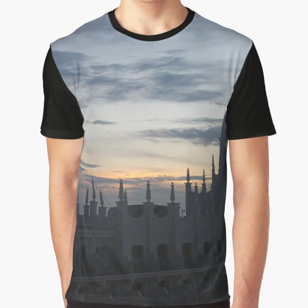 Beautiful view of the sea and the building with turrets during sunset. Graphic T-Shirt
