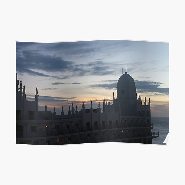 Beautiful view of the sea and the building with turrets during sunset. Poster