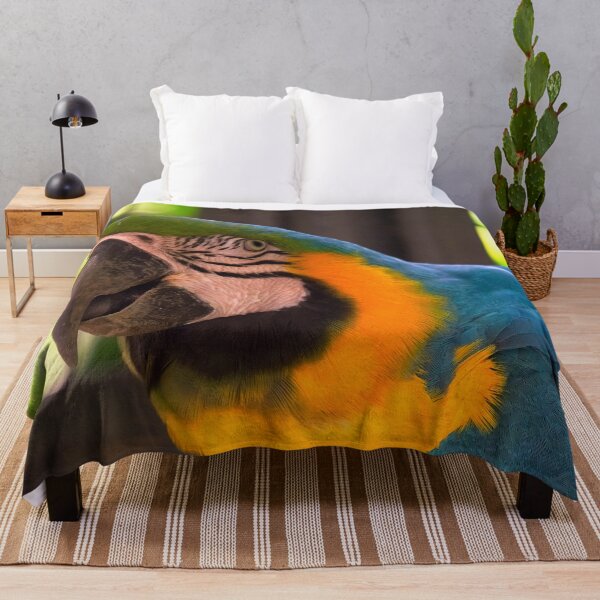 Item preview, closeup of a blue and gold macaw designed and sold by likbatonboot.