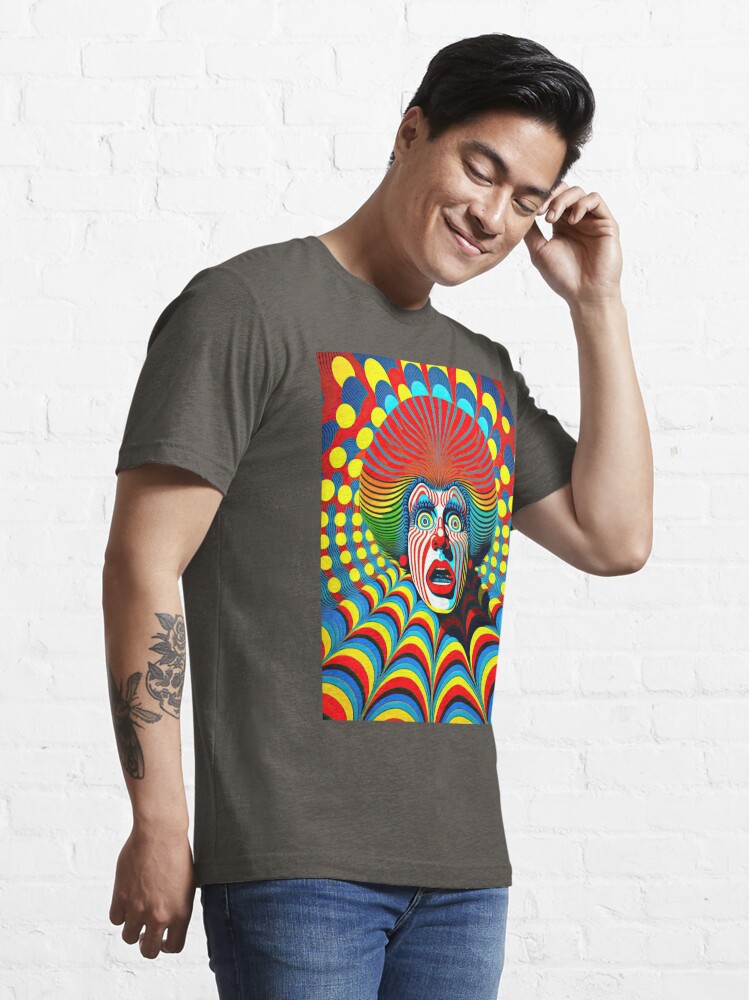 A surprised clown face on a trippy colorful op art background