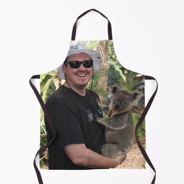 Item preview, Shane Gillis holds a koala designed and sold by Daniel Burton.