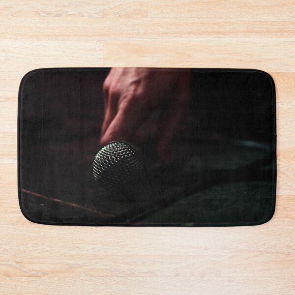 Item preview, Microphone being picked up from the floor. Color dark key live concert photography. designed and sold by nachodramis.