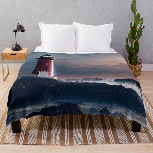 Item preview, landscape featuring a red lighthouse on rocks in a beach  designed and sold by zoldi.