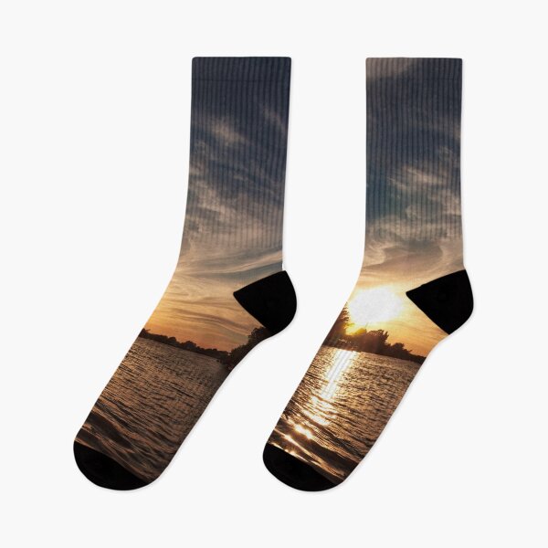Item preview, Sunset with clouds over the river, fine art photography designed and sold by nachodramis.