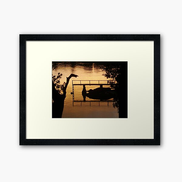 Reflections in golden water Framed Art Print