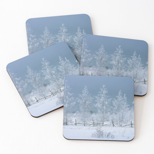 Item preview, Birch trees in fluffy frost against a dark gray sky designed and sold by Klyakhin.