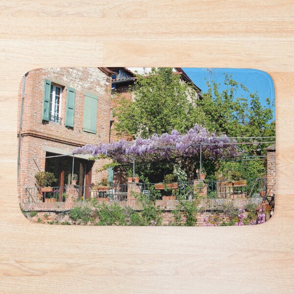 Item preview, Wisteria en las fachadas de las casas en el Gers en Francia designed and sold by franck380.