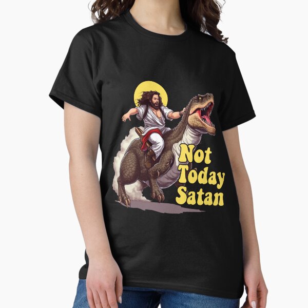 Vista previa del artículo con la obra «Hoy no Satanás Jesús montando dinosaurio T Rex Divertido sarcástico», diseñado y vendido por Get A Wear  Shop.