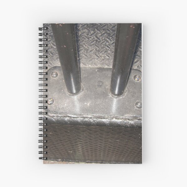 Metal, metal bollards, metal porch, sun glares Spiral Notebook