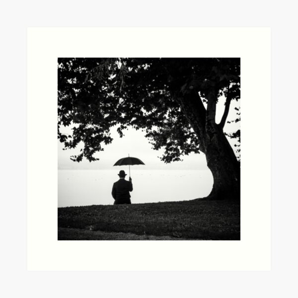 Item preview, Sunday in the park with George (man with an umbrella) riverside park black and white fine art portrait by Thomas Leuthard designed and sold by Jéanpaul  Ferro.