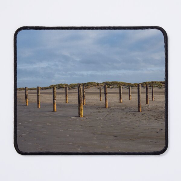 Item preview, Wooden poles on the beach of Schiermonnikoog, Netherlands designed and sold by Dolfilms.