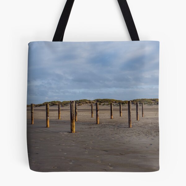 Item preview, Wooden poles on the beach of Schiermonnikoog, Netherlands designed and sold by Dolfilms.