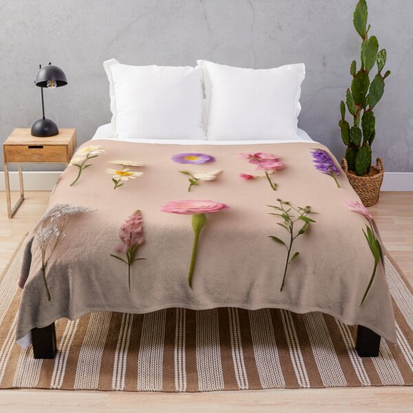 Item preview, Arrangement of spring flowers against a beige background. Blooming concept. Flat lay. Minimalistic concept. designed and sold by anytka.