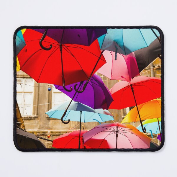 Item preview, Colorful street brocade of rain umbrellas in multi-colors color portrait photograph designed and sold by Jéanpaul Ferro.