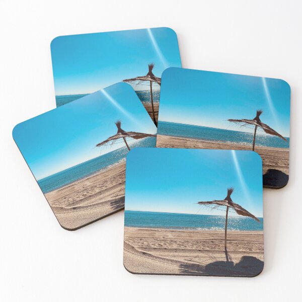 Item preview, Beach umbrella under the sunlights reflection on blue water  designed and sold by Donutlovers.