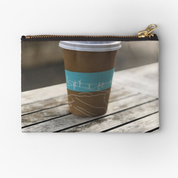 Item preview, Takeaway Coffee Cup On An Outdoor Table designed and sold by Michael McGimpsey.
