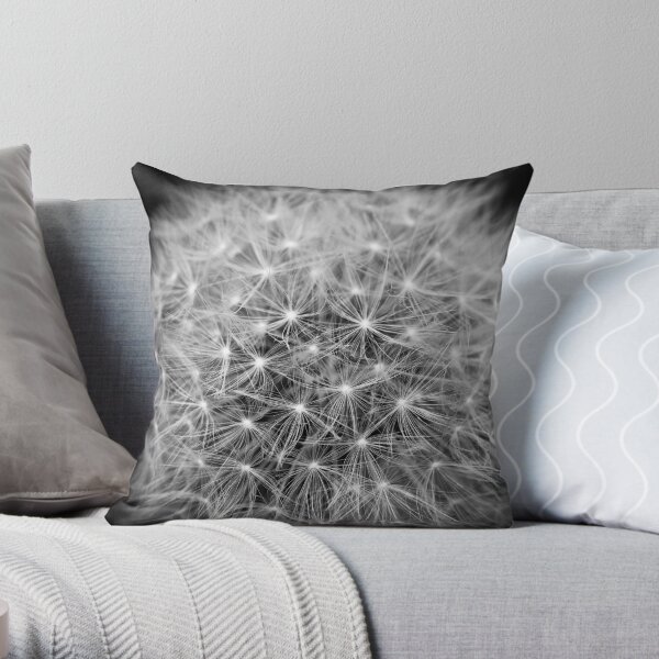 Dandelion flower head composed of numerous small florets Throw Pillow