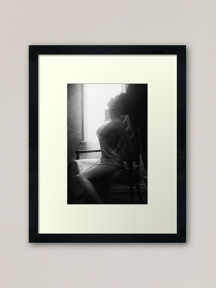 Sensual art nude black and white portrait of a woman covering her