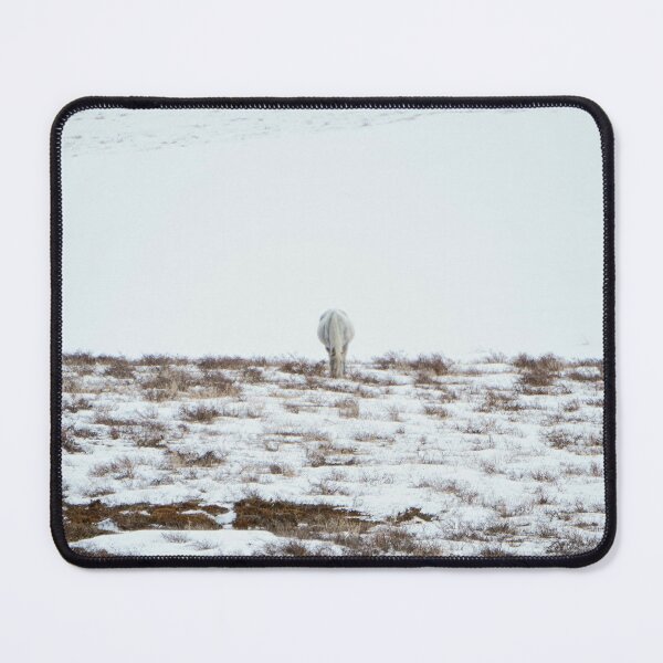 Item preview, Grazing White Horse Beneath a Snowy Hill designed and sold by Vivar Photo.