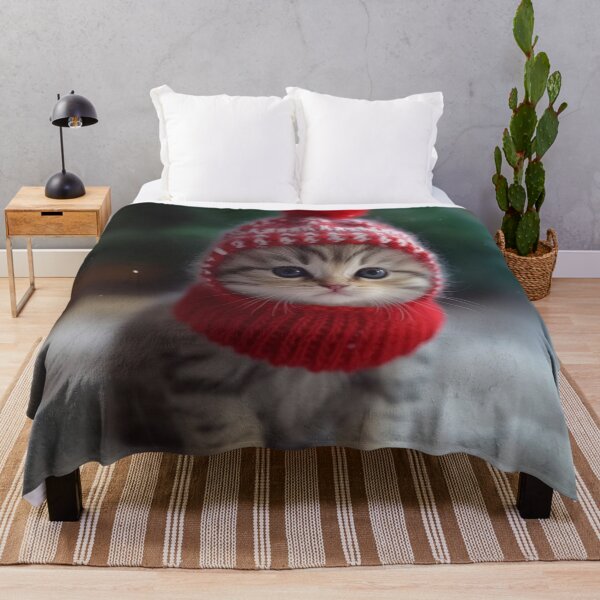 Item preview, Cute little kitten in a red hat on a background of the Christmas tree. designed and sold by aiphotosart.