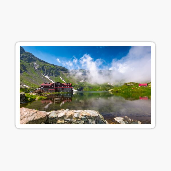 lake Balea in Fagaras mountains in foggy weather Sticker