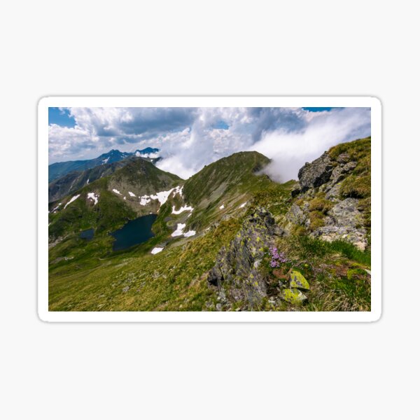 Steep slope on rocky hillside in clouds Sticker
