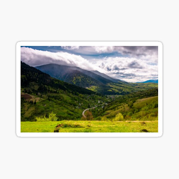 road through the village in valley of Carpathians Sticker