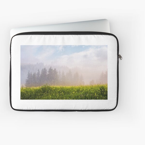 foggy sunrise in spruce forest Laptop Sleeve