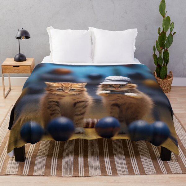 Item preview, Cute little ginger kitten playing with toy balls on wooden floor. designed and sold by aiphotosart.