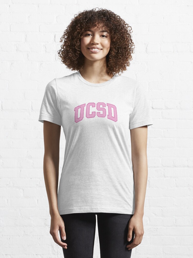 light pink shirt with white writing