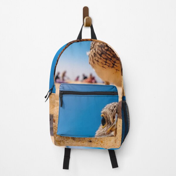 Item preview, Closeup portrait of a bird on the beach with blue sky background designed and sold by aiphotosart.