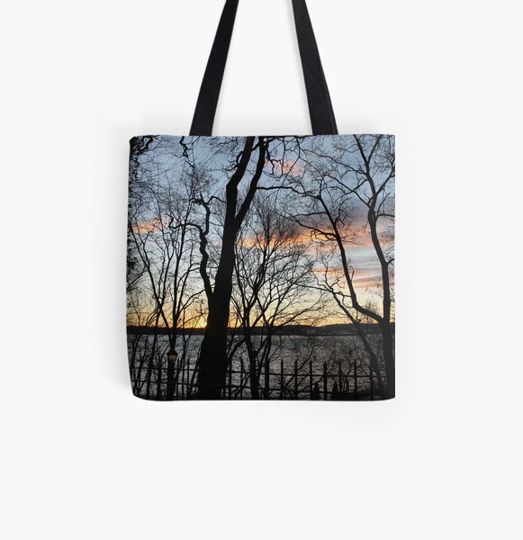 Sunset, pink clouds, trees, tree branches dance strange dance in the rays of sunset All Over Print Tote Bag