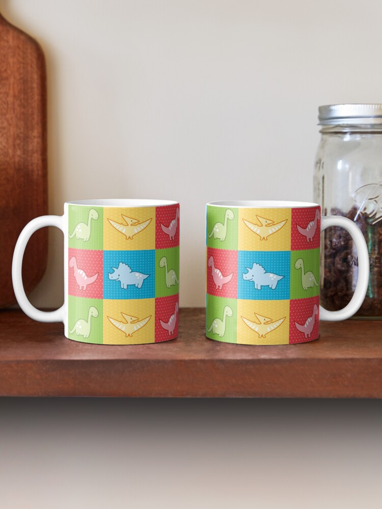 Thumbnail 2 of 6, Coffee Mug, Colorful dinosaurs and pterodactyl cheater quilt designed and sold by petitspixels.