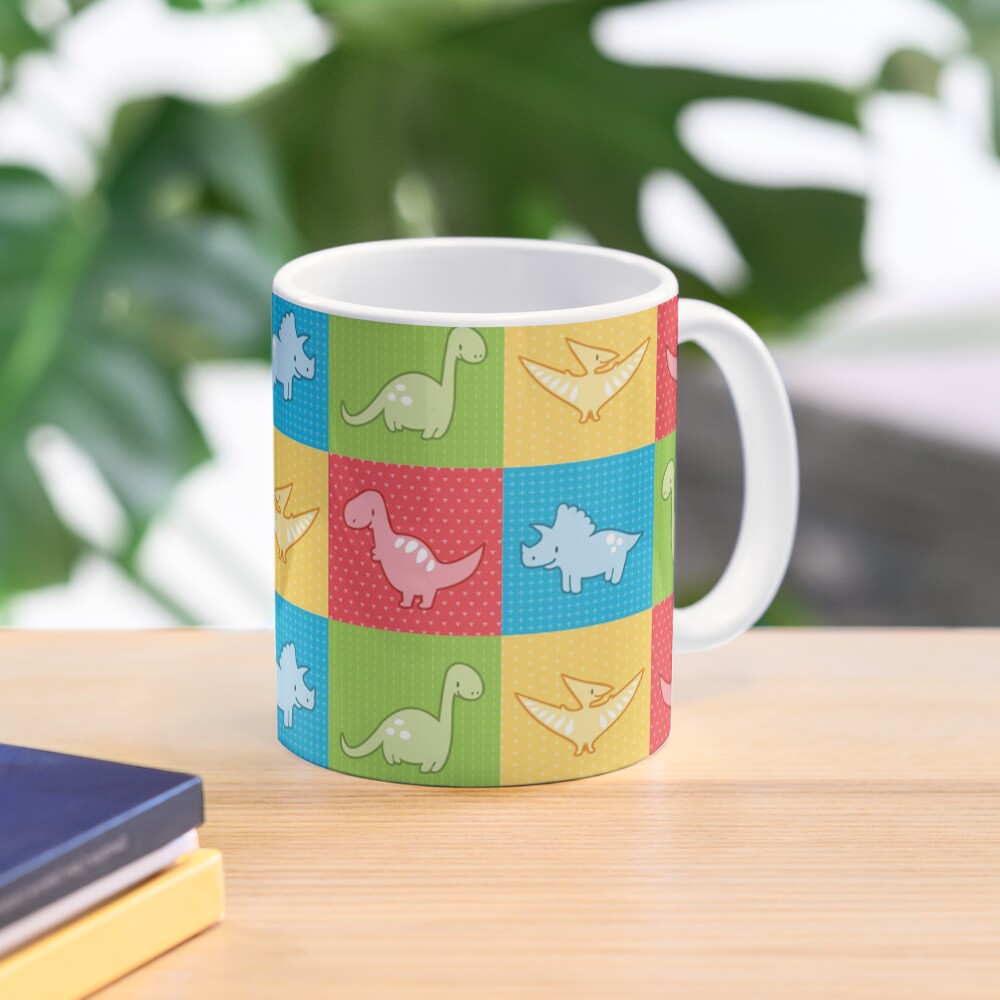 Colorful dinosaurs and pterodactyl cheater quilt Mug