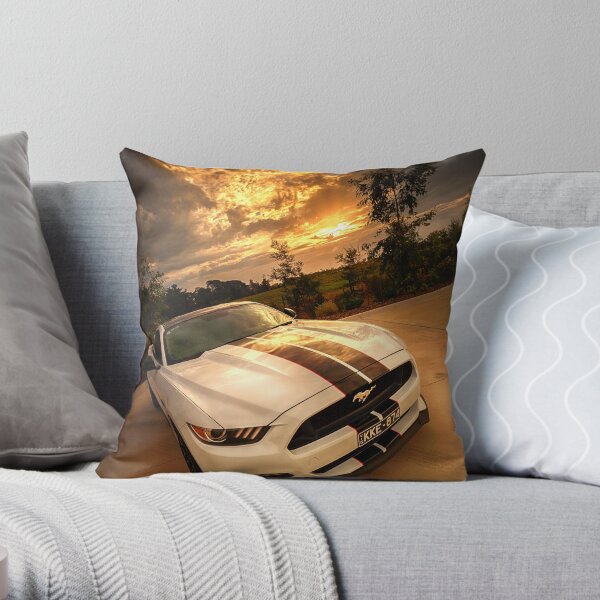 A Ford Mustang sunset Throw Pillow