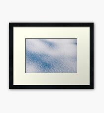 Textured snow abstract in blue Framed Print