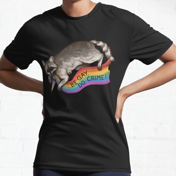 Item preview, BE GAY DO CRIME - Rainbow Flag Pride Flag Stealing Raccoon Trash Panda LGBTQIA QUEER TRANS Alphabet Mafia Funny Pride Shirt CSD Pride Month  designed and sold by Veymoth.