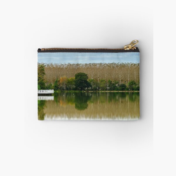 Item preview, Forest line reflecting in the lake water, autumnal landscape, France designed and sold by Alexander Sorokopud.