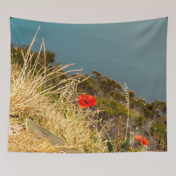 Item preview, Poppy flower on a sunny hill overlooking the ocean designed and sold by ArtyBuys.