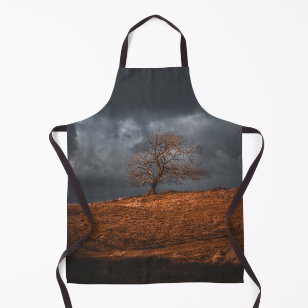 Item preview, Dramatic firey tree on a stormy winter sky in the Lake District designed and sold by chiaravisuals.