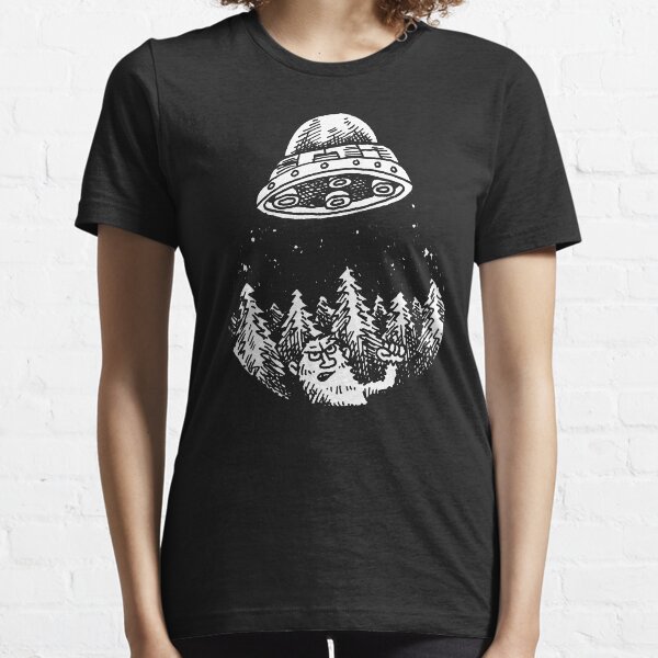 UFO buzzes Yeti in the forest Essential T-Shirt